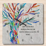 Erstellen Sie Ihr eigenes inspirierendes/Motiviere Quadratische Wanduhr<br><div class="desc">Diese einzigartige Wall Clock ist mit einem farbenfrohen Mosaik Tree of Life Design dekoriert. Fügen Sie Ihr ausgewähltes Angebot hinzu,  um es zu personalisieren. Klicken Sie auf Weitere Einstellungen,  um Schriftart,  Schriftart und Schriftart zu bearbeiten. Original Mosaik © Michele Davies.</div>