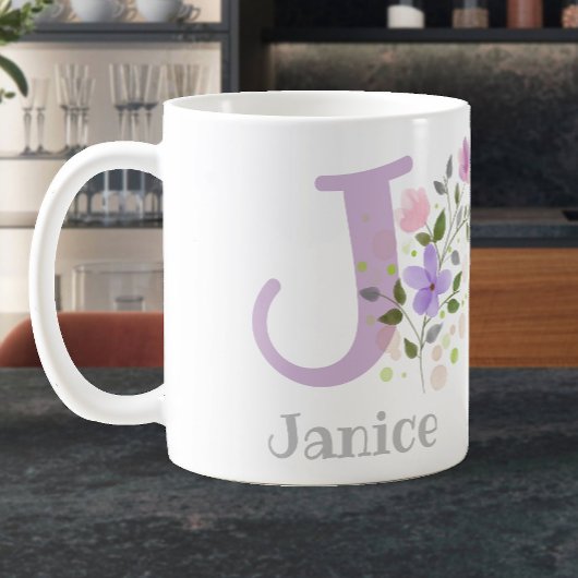 Erster Anfangsbuchstabe plus Name Janice mit Blume Kaffeetasse