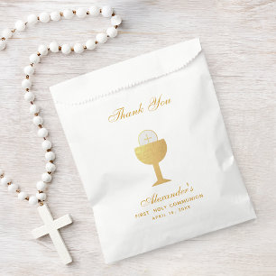 Erstkommunion-Kelch und -Eucharistie aus falscher  Geschenktütchen