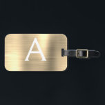 Erstmalige Bezeichnung für das Gold Brushed Metal  Gepäckanhänger<br><div class="desc">Luxuriöse goldgegossene Metallfolie Monogram Name und erste Gepäckmarke. Diese Taschenmarke ist ideal für Zurück in die Schule,  Arbeit oder Reisen.</div>