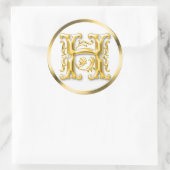 Erstmaliger H-Round-Aufkleber in Gold Runder Aufkleber (Tasche)