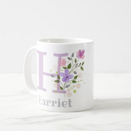 Erstmaliges Plus Name Harriet mit Blume Kaffeetasse (Vorderseite Links)