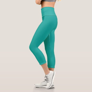 Erweitern Sie Ihr Design mit einem grünen Hintergr Capri Leggings