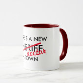 es gibt einen neuen Sheriffdoktor im Tasse (VorderseiteRechts)