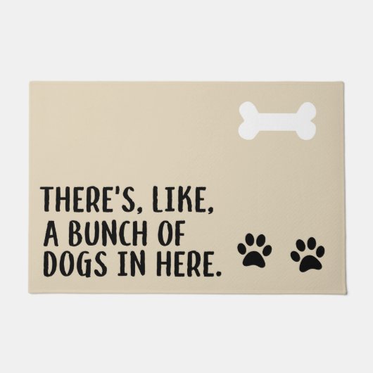 "Es gibt, wie, ein Bündel Hunde hier" in der Fußmatte (Vorderseite)