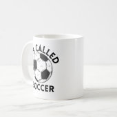 Es heißt Fußball Kaffeetasse (Vorderseite Links)