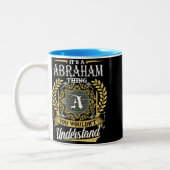 Es ist ein Abrahams-Ding, das man nicht verstehen  Zweifarbige Tasse (Links)