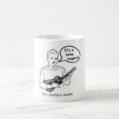 Es ist ein Babymagnet! (Ukulele) Kaffeetasse (Mittel)
