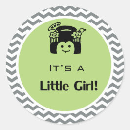 Es ist ein grün-graues, Zickzack Aufkleber. Runder Aufkleber