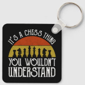 Es ist ein Schachspiel - man würde es nicht verste Schlüsselanhänger (Rückseite)