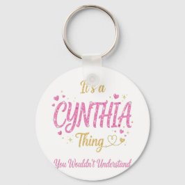 Es ist eine Cynthia-Sache Pink Gold Frauen-Geschen Schlüsselanhänger