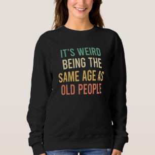 Es ist merkwürdig, das gleiche Alter wie alte Mens Sweatshirt