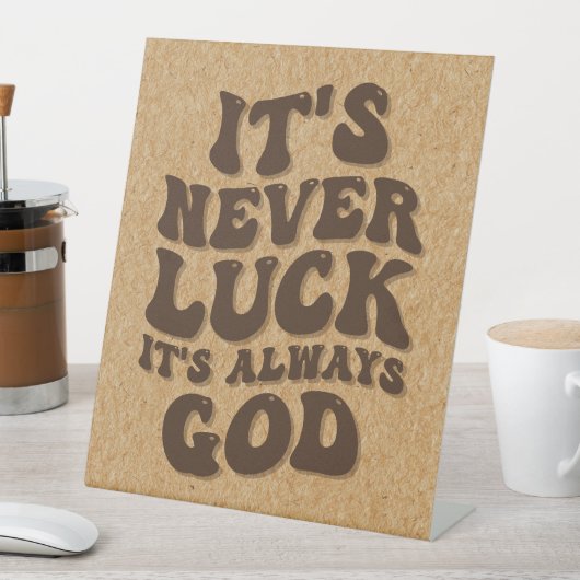 Es ist nie Glück. Es ist immer Gott Sockelschild (In Situ)