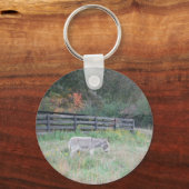 Esel in einem Herbstfeld. Schlüsselanhänger (Vorderseite)