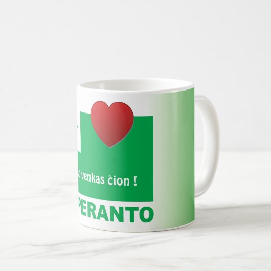 Esperanto / "Amo venkas resonion", Kaffeetasse (VorderseiteRechts)