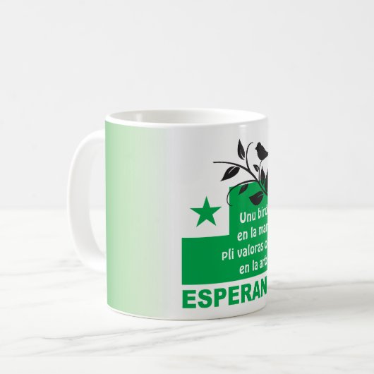 Esperanto/"Unu birdo en-La mano pli valoras…", Kaffeetasse (Vorderseite Links)
