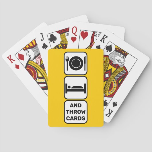 Essen, schlafen und Karten mit gelben Spielkarten (Rückseite)