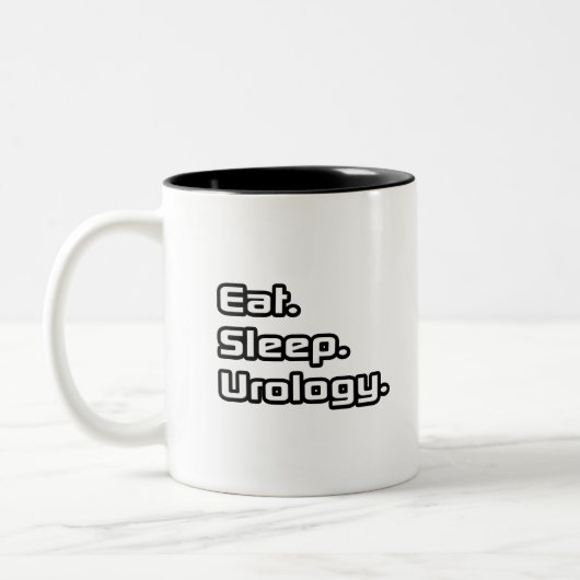 Essen. Schlafen. Urologie. Zweifarbige Tasse (Links)