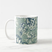 ethnisch-blumengeschmückte Muster. folklorischer B Kaffeetasse (Links)