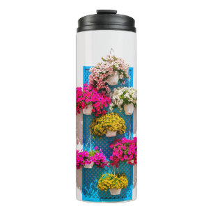 Ethnische Blüte: Gartenmauer Thermosbecher