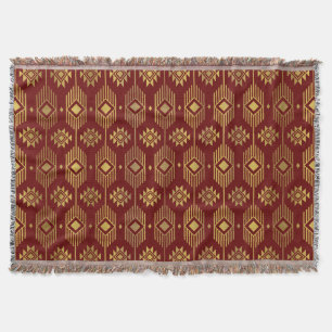 Ethnische rote und goldene Ikat-Geometrie Decke