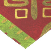 Ethnisches afrikanisches goldenes Muster auf Farbe Tischdecke (Schrägansicht)