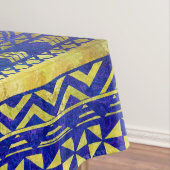 Ethnisches afrikanisches goldenes Muster auf Tischdecke (Beispiel)