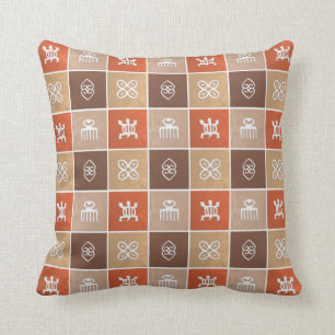 Ethnisches afrikanisches Muster mit Adinkra Kissen