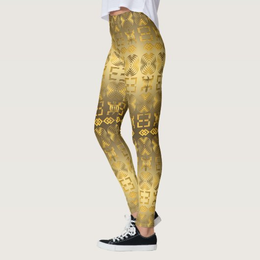 Ethnisches afrikanisches Muster mit Adinkra Leggings (Links)