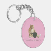 Etwas ist das Brennen von rosa Acrylglas-Schlüssel Schlüsselanhänger (Vorderseite links)