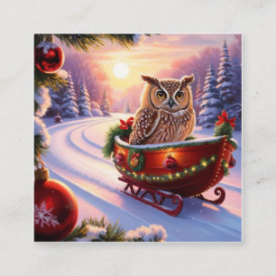 Eule auf einem Schlitten während der Ferien Quadratische Visitenkarte