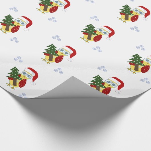 Eule in einer Weihnachtsmannmütze mit einem Weihna Geschenkpapier (Ecke)