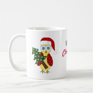 Eule in einer Weihnachtsmannmütze mit Weihnachtsba Kaffeetasse