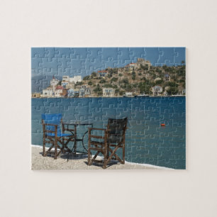 Europa, Griechenland, Kastellorizo: Stühle am Rand Puzzle