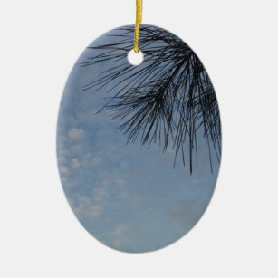 Evergreen Pine Against Snowy Blue Sky Keramikornament