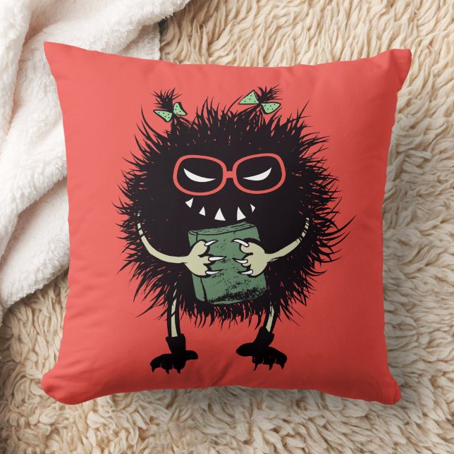 Evil Book Lover Character - Edgy Reading Kissen (orange red pillow with an evil character with eyeglasses and ponytails grinning and holding a book)