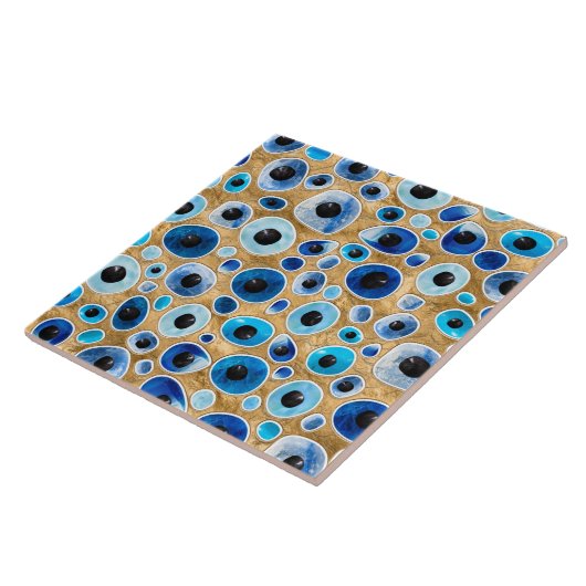 Evil Eye Muster Tumbled Stones on gold Fliese (Seite)