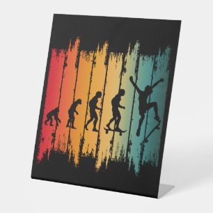 Evolution des Skateboarding-Skaters Sockelschild