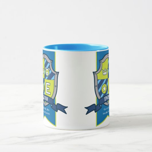 Ewan Buchstabe E Wappen blau grün bedeutet Tassen (Zentrum)