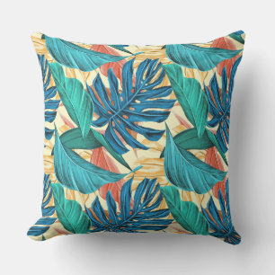 Exotische tropische Blätter auf hellgelb Kissen