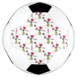 Exotisches Blumenarrangement im Glas Fußball