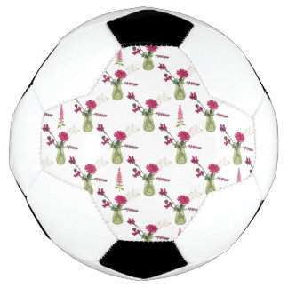 Exotisches Blumenarrangement im Glas Fußball