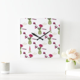 Exotisches Blumenarrangement im Glas Quadratische Wanduhr