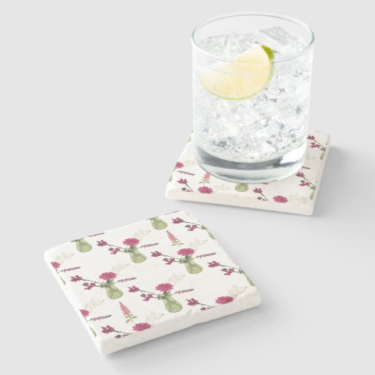 Exotisches Blumenarrangement im Glas Steinuntersetzer (Seitenansicht)