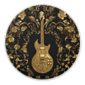 Extravagante goldene Gitarre auf schwarz Keramikknauf (Vorderseite)