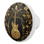 Extravagante goldene Gitarre auf schwarz Keramikknauf (Rechts)