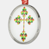 EXTRAVAGANTER KROSS ORNAMENT AUS METALL (Links)