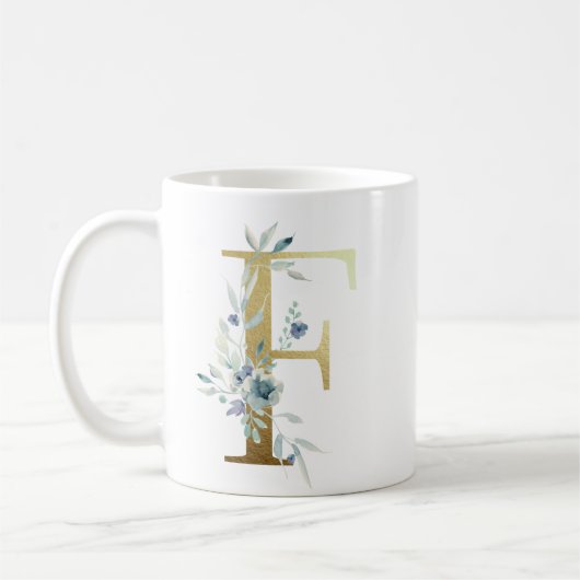F Goldener Erstling mit blauem Blumenblättern Kaffeetasse (Links)
