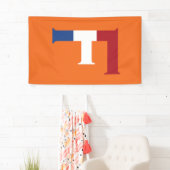 F Monogram überlagert sich auf der NLD-Flagge auf  Banner (Insitu)