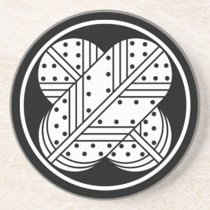 Fadenspule mit verschieden gefleckten Habichtenfed Sandstein Untersetzer